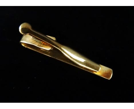 9ct gold - A sprung marked tie clip, weight 4.3g.