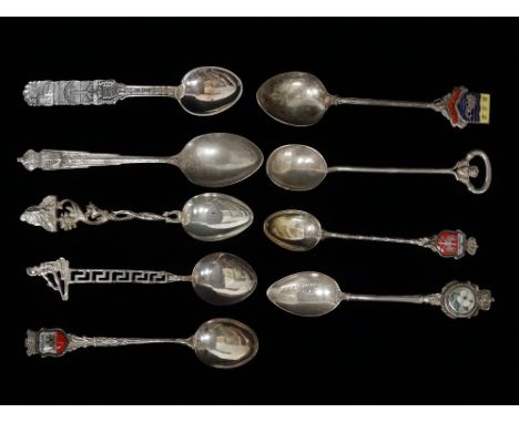 A collection of silver teaspoons, .800 and .925, many with guilloche enamel terminals, weight 79g. 