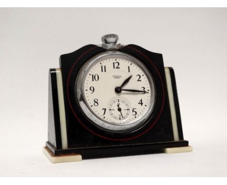 Art Deco - A black and white bakelite pocket watch stand by H. Windsor &amp; Co. (Basalt) Ltd, together with a Smiths chromiu