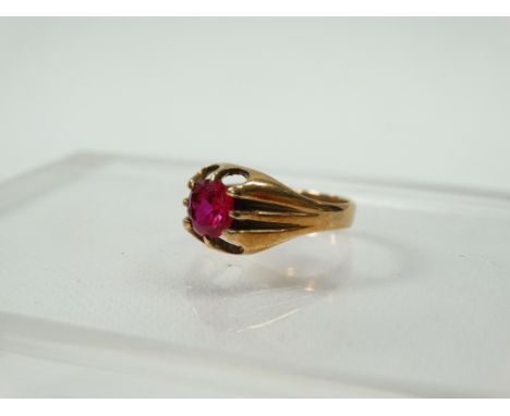 A 9ct gold ring set a faceted ruby, size M/N.