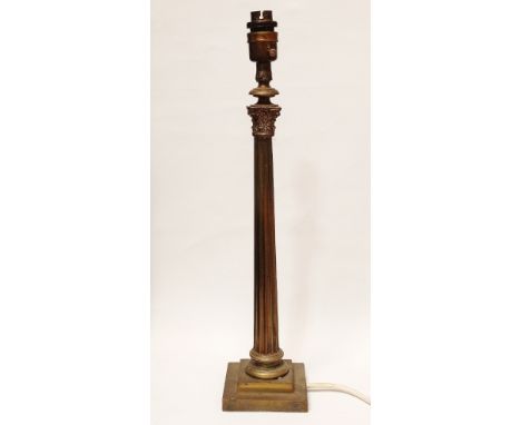 Corinthian column lamp - A 1930s lamp with fluted column on a double square stepped base, height 47cm.