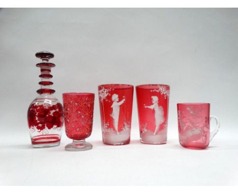 Mary Gregory etc - A pair of cranberry glass beakers with white enamel decoration, a clear handled cranberry glass with simil