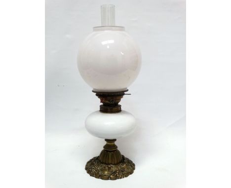 19th century Hinks &amp; Sons Patent - A brass and milk glass oil lamp with named collar and embossed pedestal base decorated