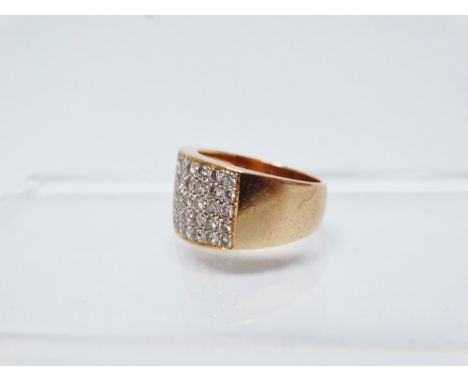 18ct gold and diamond ring - A pave set diamond ring with five rows of nine diamonds, marked .750, size P. 