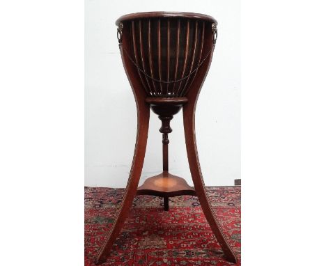 Edwardian triform planter - A mahogany inlaid and strung planter with brass jardiniere, lion's masque and spherical draped de