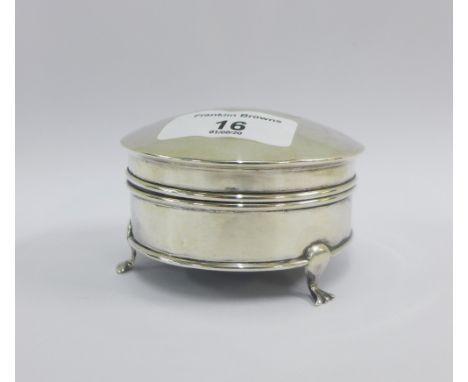 Early 20th century  silver trinket box, with hinged lid and  three hoof feet, 8cm diameter 