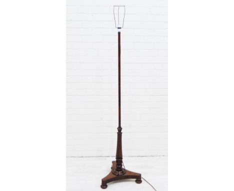 Mahogany standard lamp with triform bases and three bun feet, 150cm high 