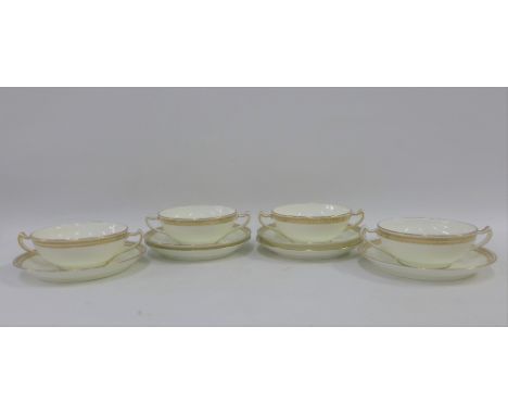 Set of four English porcelain twin handled bowls with laurel leaf gilt edged rims together with six matching saucers, with T.