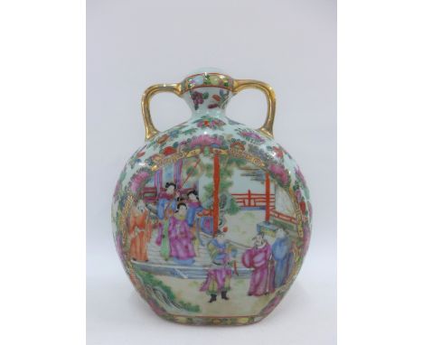 A Chinese famille rose moon flask vase with gilt handles, 25cm high 