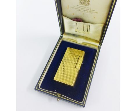 Gold plated Dunhill lighter in presentation box. 