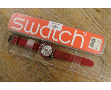 A VINTAGE SWATCH WATCH IN ORIGINAL CASE