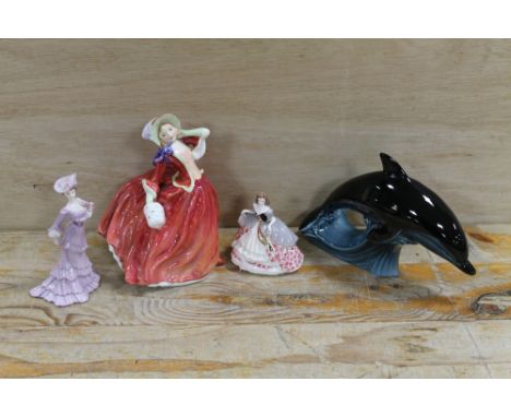 A ROYAL DOULTON FIGURE 'AUTUMN BREEZES' TOGETHER WITH TWO SMALL COALPORT FIGURINES AND A POOLE DOLPHIN (4)