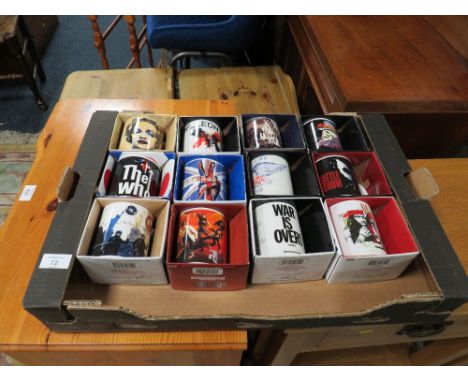 A TRAY CONTAINING 12 NEW BOXED POP MUSIC RELATED MUGS TO INCLUDE THE WHO x 2, MADONNA, KINGS OF LEON, COLDPLAY, AEROSMITH, U2