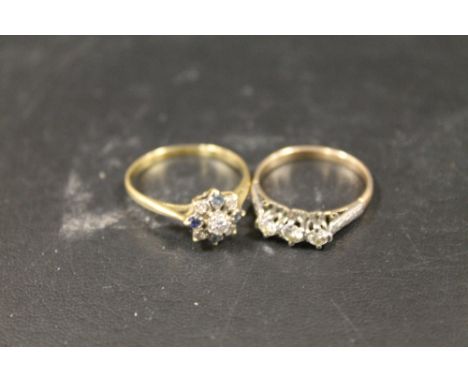 A THREE STONE DIAMOND RING HALLMARK RUBBED APPROX 2G TOGETHER WITH AN UNMARKED SAPPHIRE AND DIAMOND EXAMPLE 2.1G