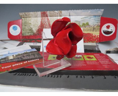 A LIMITED EDITION TOWER OF LONDON "BLOOD SWEPT LANDS AND SEAS OF RED" CERAMIC POPPY BY PAUL CUMMINS, MADE FOR THE ART INSTALL