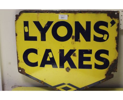 A VINTAGE ENAMEL SIGN FOR LYONS' CAKES 