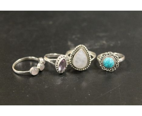 A COLLECTION OF FOUR 925 SILVER GEMSTONE DRESS RINGS TO INC AMETHYST, TURQUOISE , OPAL ETC