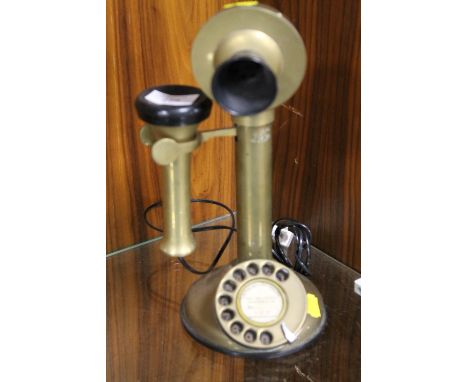 A VINTAGE BRASS STICK TELEPHONE 