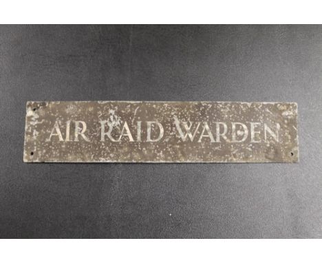 A VINTAGE 'AIR RAID WARDEN' METAL PLAQUE