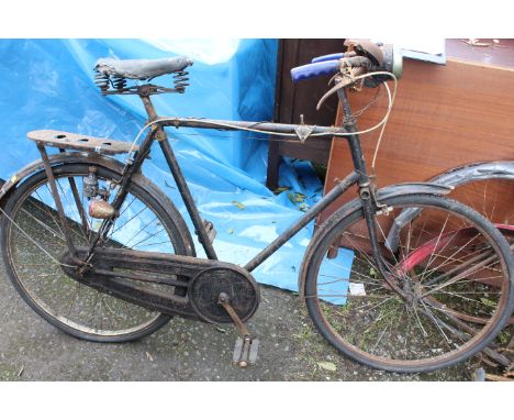 A VINTAGE BICYCLE TOGETHER WITH A COLLECTION OF SPARES