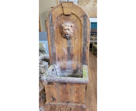 A fibre glass/ resinl decorative garden water fountain / feature, decorated with a lion visage, above water trough. 150cm x 6