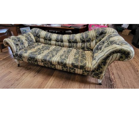 A blue &amp; gold upholstered Regency sofa / chaise longue, some damage. 83cm x 220cm x 83cm. 