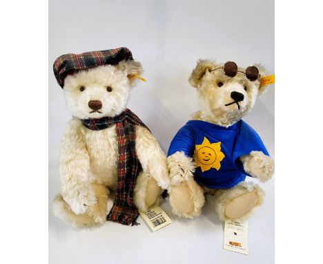 A Steiff white Summer Bear and white Winter USA Bear, both 35cm. (2) 