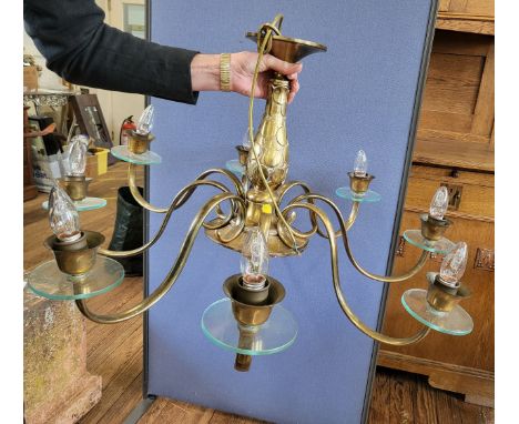 A  brass eight armed ceiling light fitting, 54cm x 90cm. 