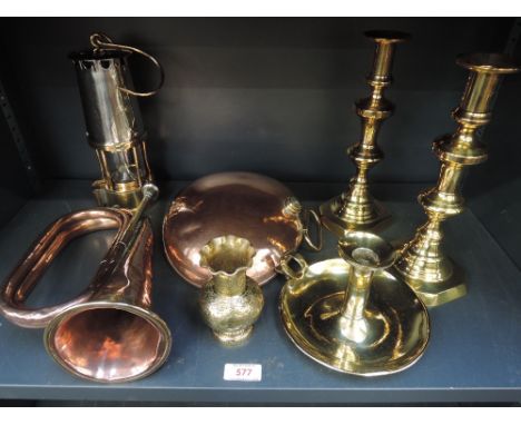 A pair of Victorian brass candlesticks, a brass chamber stick, a vintage miners lamp, a Benares vase, a copper hunting horn a