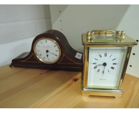 A modern Edwardian style mahogany mantel clock by Knight & Gibbons and a modern traditional style carriage clock by Worcester