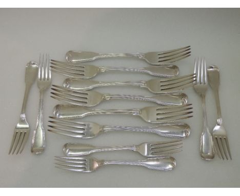 Eleven Georgian silver dinner and desert forks of fiddle pattern, London 1807, Richard Crossley & George Smith, and a matched