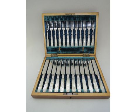 A canteen of 12 plated dessert knives and forks having mother of pearl handles