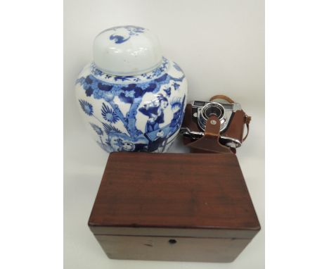 A 19th century mahogany tea caddy, a Kodak Retina camera and an early 20th century Chinese blue and white ginger jar