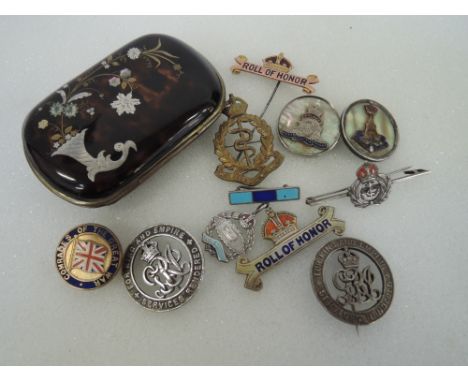 A late 19th century tortoiseshell purse having mother of pearl and white and yellow metal inlay decoration, and a selection o