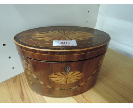 An early 19th century mahogany tea caddy of oval form having extensive shell and swag inlay decoration 