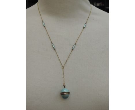 A 1920's yellow metal and enamel vinaigrette necklace having turquoise guilloche enamel decoration and further matching panel