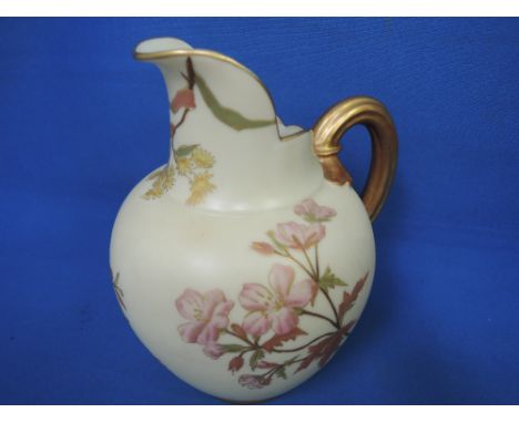 A Royal Worcester jug having gilt heightened naturalistic decoration on blush ivory ground numbered 1094