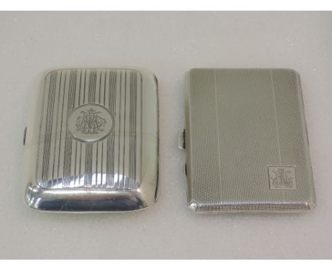 Two HM silver cigarette cases having engine turned decoration and gilt interiors, approx 137g