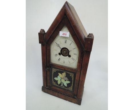 A 19th century American mantel clock having pictorial glass decoration labelled New Haven, Conn