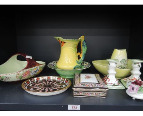 A Maling lustre basket, a similar bowl, a Royal Crown Derby oval tray in the Imari palette, a Burleighware parrot jug, Carlto