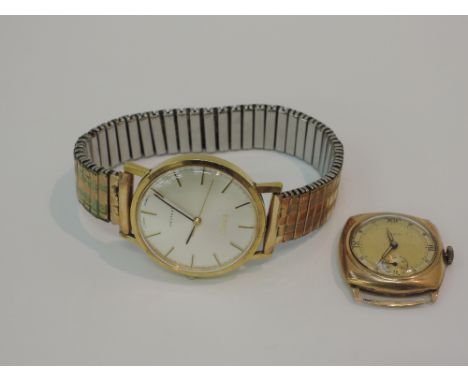 A gents wrist watch by Tissot having baton numerals to face on a plated stretch strap, and a gents 9ct gold wrist watch by Ae