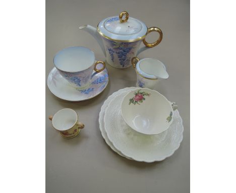 A Shelley, tea for one, breakfast set in blue floral pattern, a Royal Worcester miniature loving cup having floral decoration