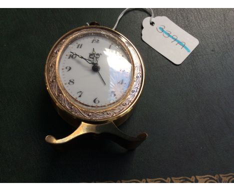 Swiza Small Oval Bedside Clock, gilt brass finish, with alarm setting