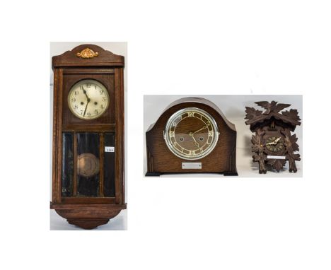 German Black Forest Cuckoo Clock together with a 1930's oak cased mantle clock and box clock.