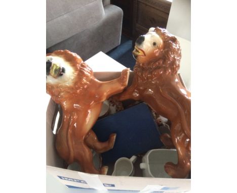 Two Ceramic Lions Together with 1937 caddy and box of EPNS spoons.