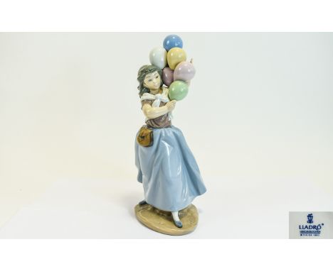 Lladro Porcelain Figurine ' Balloon Seller ' Model No 5141. Issued 1982 - 1996. Sculptor Vicente Martinez. Height 10.5 Inches