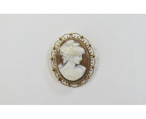 A Large 9ct Gold Mounted Oval Shaped Shell Cameo of Fine Quality, with Attached 9ct Gold Safety Chain. Fully Hallmarked. Feat