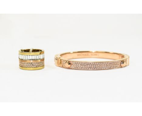 Michael Kors Designer Ring and Bangle. Rose gold tone bangle with crystal detail. Also, a gold tone ring with crystal detail 