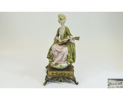 Capodimonte Fine Quality Hand Painted Porcelain Figurine ' Young Lady ' Dressed In 18th Century Costume, Seated Playing a Lut