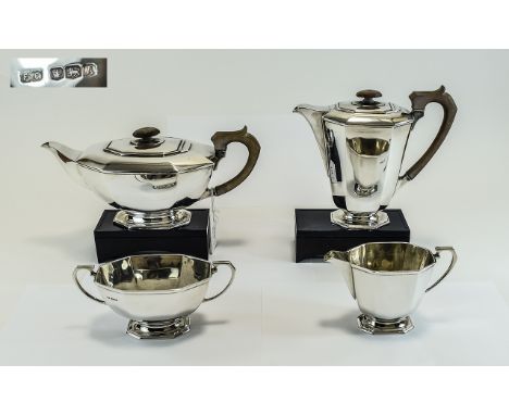 George VI 4 Piece Silver Tea Service, Art Deco lines. Hallmark Sheffield 1943, Makers F.C. Water Jug - 7.75 Inches High. Teap